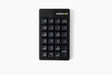 A black Goldtouch Elite Numeric Keypad with mechanical keys, designed for use with a keyboard and mouse.