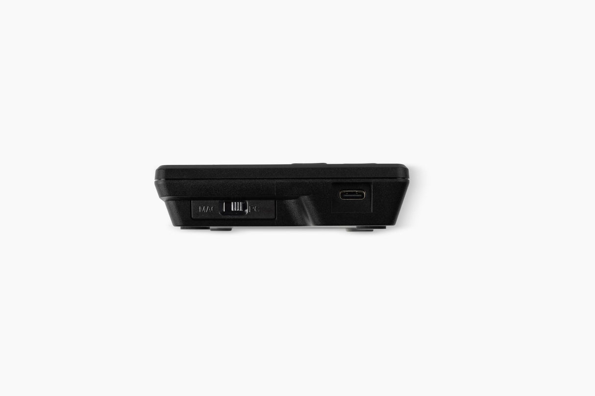 The Goldtouch Elite Numeric Keypad showing the top Mac and PC switch as well as USB-C charging port on a white background.