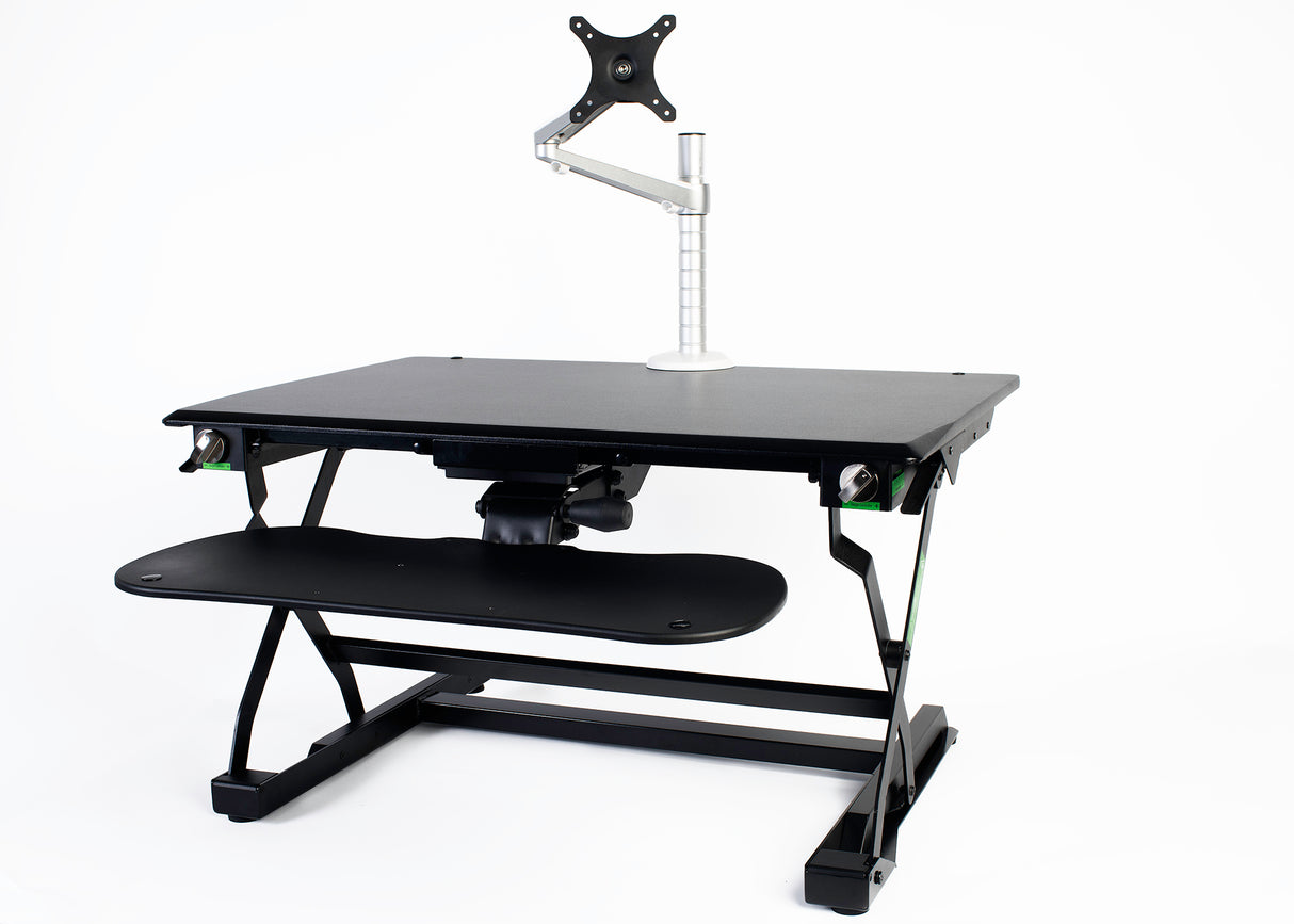 An image of a Goldtouch EasyLift Desk with Single EasyLift Monitor Arm.