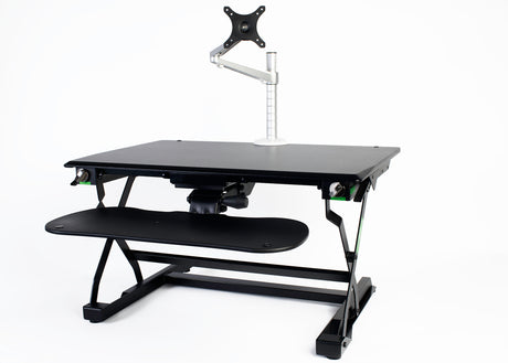 An image of a Goldtouch EasyLift Desk with Single EasyLift Monitor Arm.