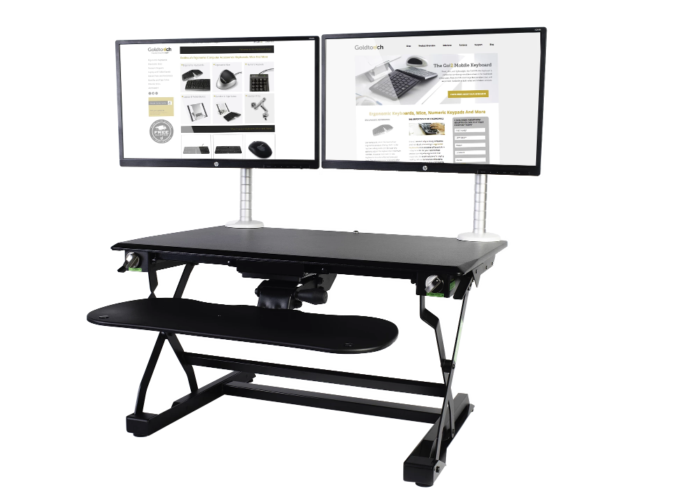 An image of a Goldtouch EasyLift Desk with keyboard tray extended and two Single EasyLift Monitor Arms with monitors and screens on them. 