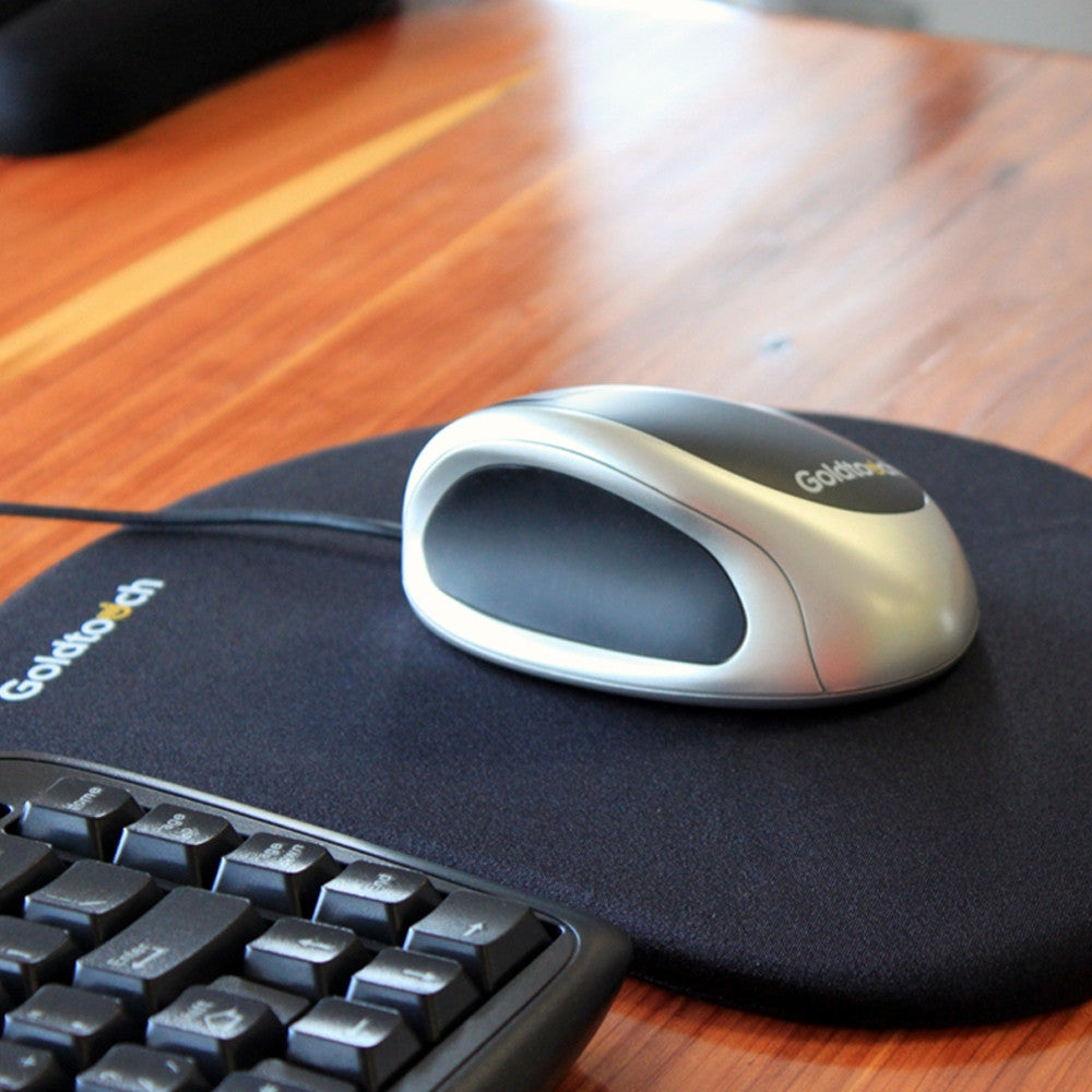 mouse on gel filled mouse pad next to keyboard